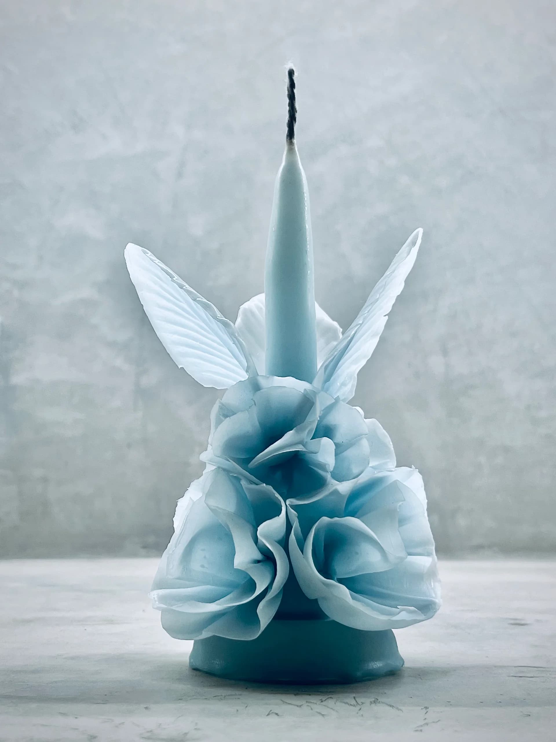 Blue flaked-wax candle