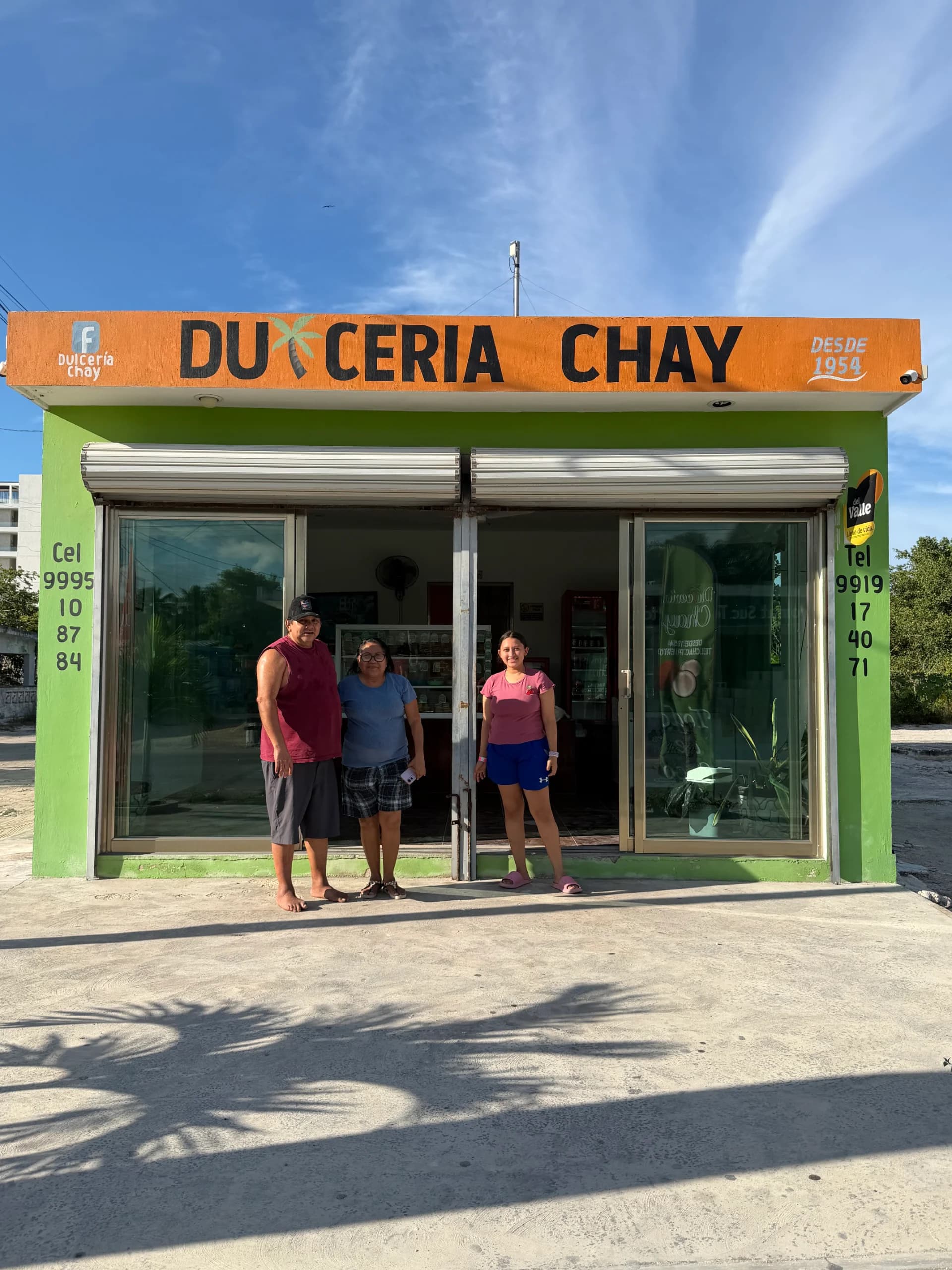 The Chay family in front of their candy shop in Telchac Puerto